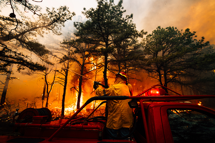 Firefighters battle the Jones Road Wildfire in Ocean County (photo courtesy of the New Jersey Department of Environmental Protection).