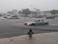Photo of flash flooding in a parking lot