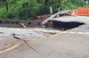 The aftermath of flash flooding in Warren County on July 16th as seen along Brass Castle Creek on Harmony Brass Castle Road by Hartsman Corner Road, Washington Township.