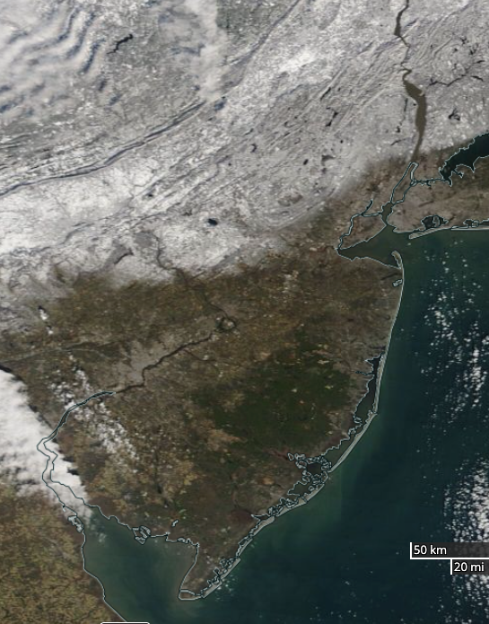 NASA MODIS visible satellite image on the morning of January 8th showing snow cover over New Jersey and surroundings north of approximately Route 1.