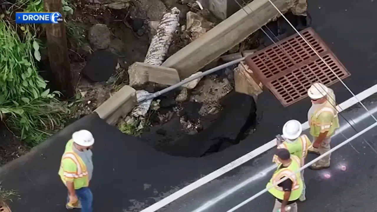 A large hole opened along part of US-322 in Mullica Hill as a result of flooding rains on Thursday, August 27.
