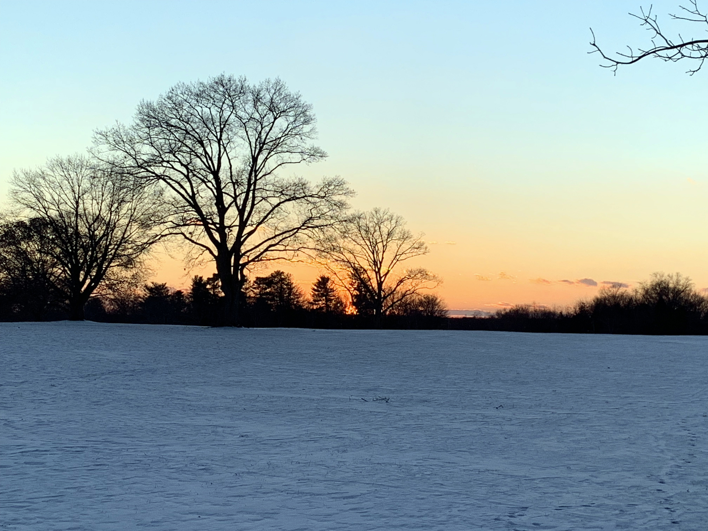 Sunset over a snow-covered field on February 14 at Colonial Park in Franklin Township (Somerset County).