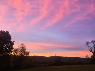 Photo of sunset over Wantage (Sussex County) on September 25th, as a strong nor'easter was approaching the state. High Point monument is visible in the background. 